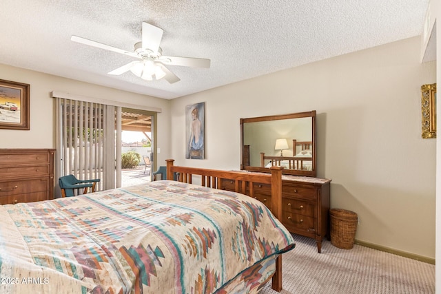 carpeted bedroom with access to exterior, ceiling fan, a textured ceiling, and baseboards