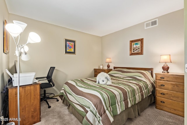 bedroom with carpet and visible vents