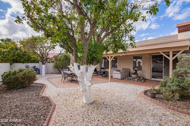 view of yard featuring a patio area and fence