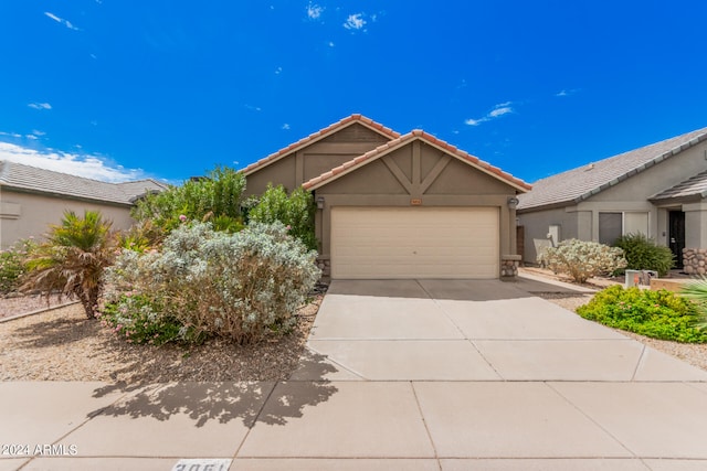 view of front of property featuring a garage