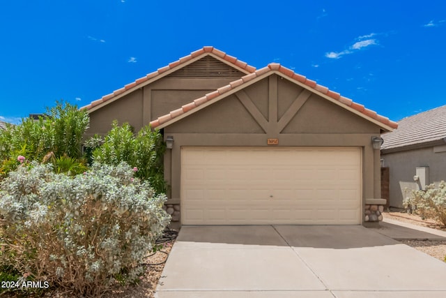 view of front of property featuring a garage