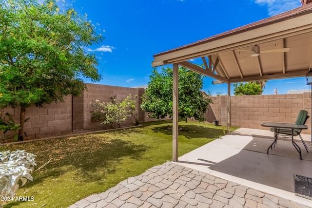 view of patio / terrace featuring ceiling fan