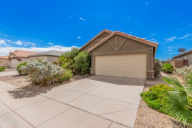 view of front of property with a garage