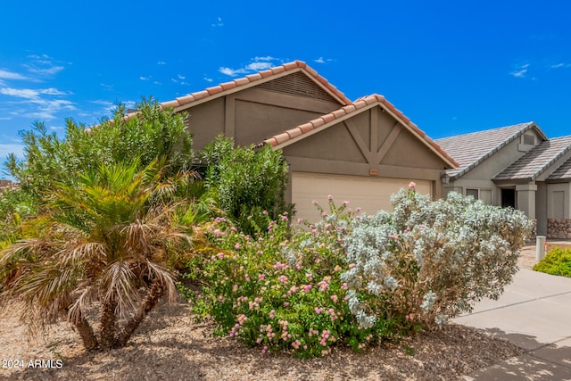 view of front of home with a garage