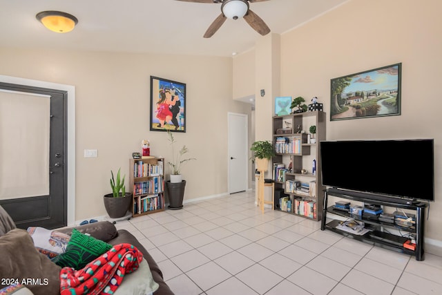 tiled living room featuring vaulted ceiling and ceiling fan