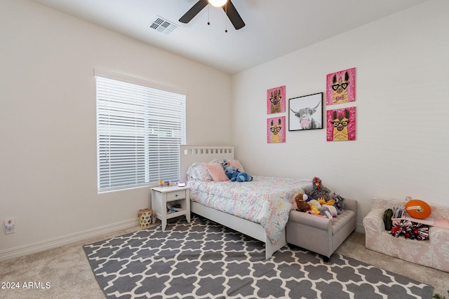 bedroom featuring a ceiling fan, baseboards, visible vents, and carpet flooring