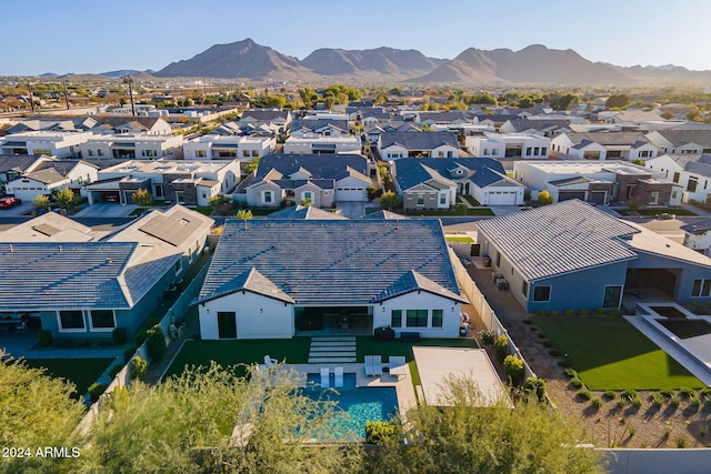 drone / aerial view with a residential view and a mountain view