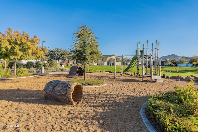 community playground with a mountain view