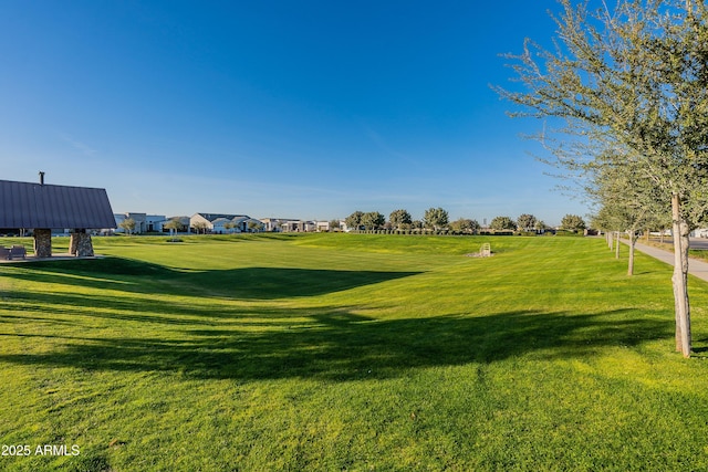 view of home's community featuring a yard