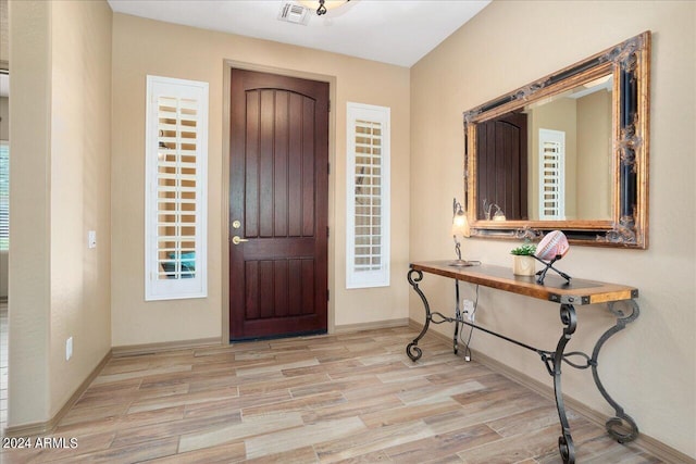 entrance foyer featuring light hardwood / wood-style floors