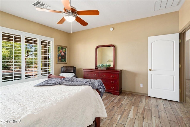 bedroom featuring ceiling fan and light wood-type flooring