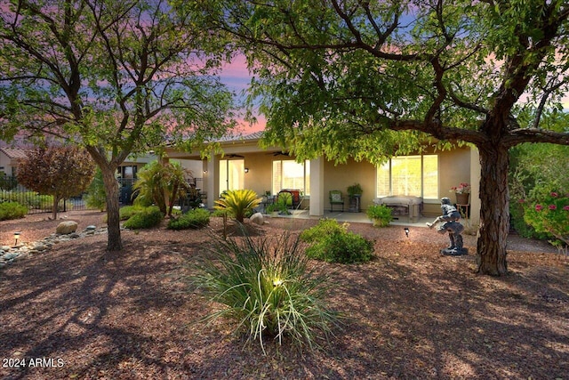 view of front of home featuring a patio area