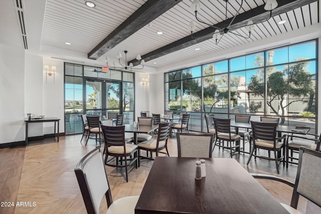 dining space with wooden ceiling, beamed ceiling, and french doors