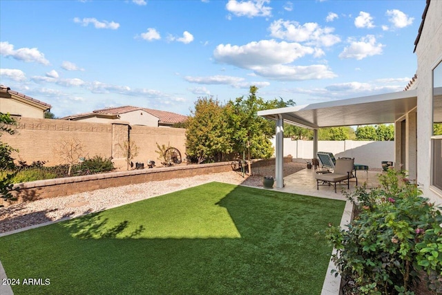 view of yard with a patio area