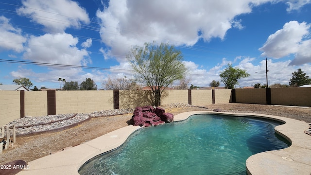 view of pool featuring a fenced in pool and a fenced backyard