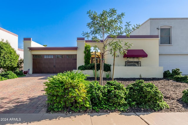 view of front of property featuring a garage