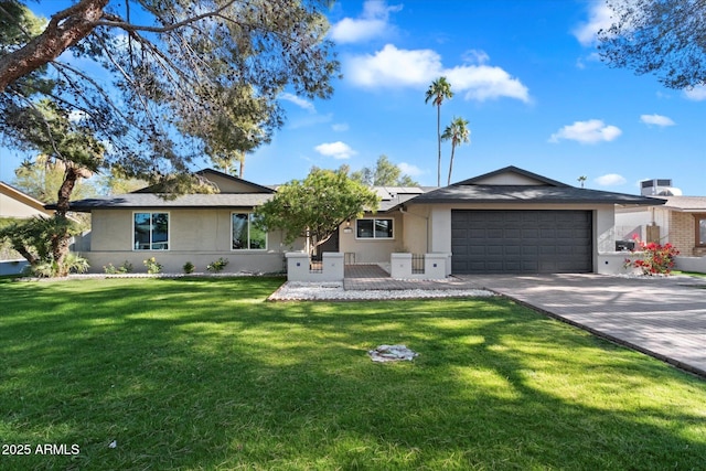 ranch-style home featuring a front yard and a garage