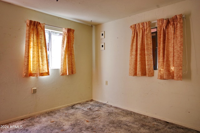 view of carpeted spare room