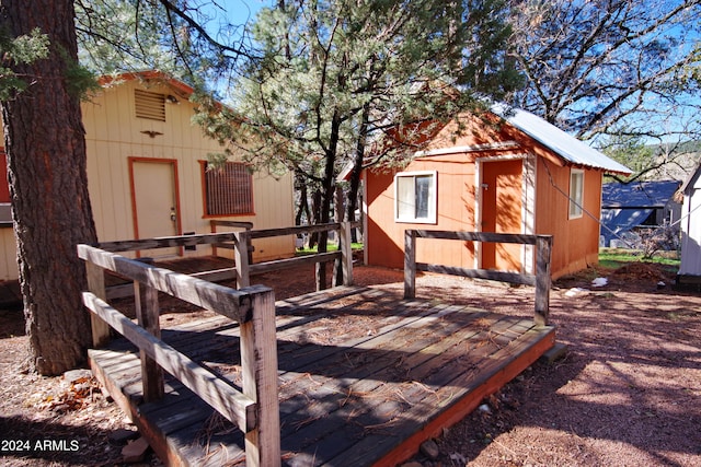 deck with an outdoor structure