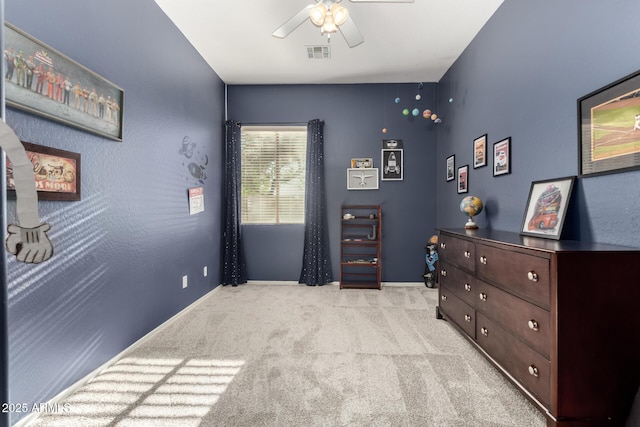 12798 W Dove Wing Way, Peoria, AZ 85383 - carpeted bedroom with baseboards and a ceiling fan