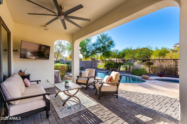 12798 W Dove Wing Way, Peoria, AZ 85383 - view of patio featuring a fenced backyard, ceiling fan, and outdoor lounge area