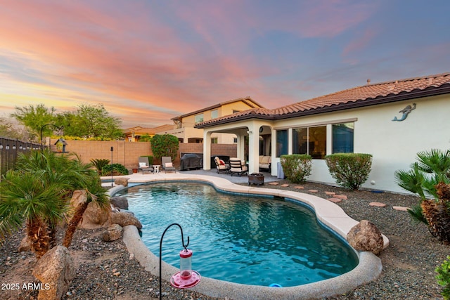 12798 W Dove Wing Way, Peoria, AZ 85383 - view of pool featuring a patio area and a fenced backyard