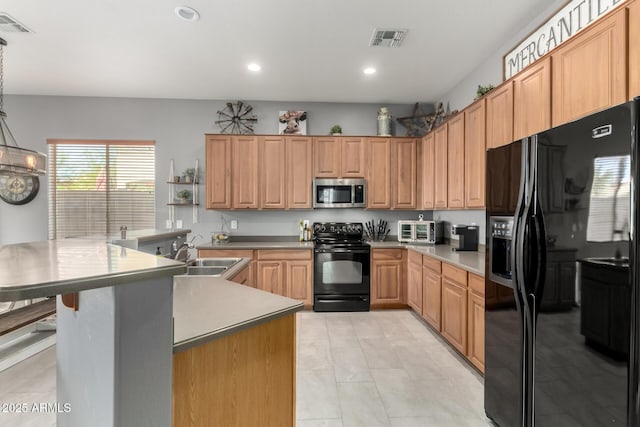 12798 W Dove Wing Way, Peoria, AZ 85383 - kitchen featuring black appliances, a sink, light tile patterned floors, recessed lighting, and a breakfast bar
