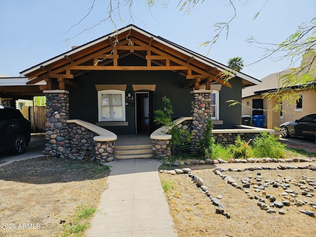 723 E Moreland St, Phoenix, AZ 85006 - craftsman-style house with a porch and stucco siding