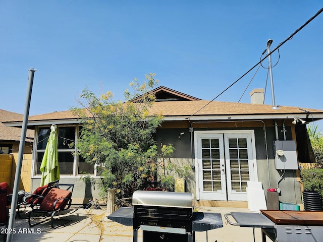 723 E Moreland St, Phoenix, AZ 85006 - rear view of property with french doors, a patio area, roof with shingles, and stucco siding