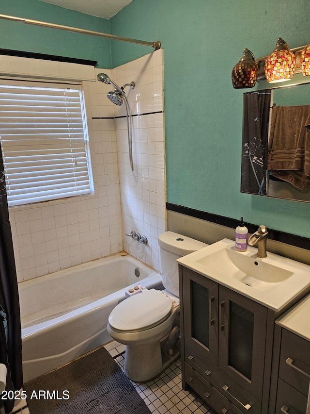 723 E Moreland St, Phoenix, AZ 85006 - bathroom featuring vanity, shower / tub combo with curtain, toilet, and tile patterned flooring