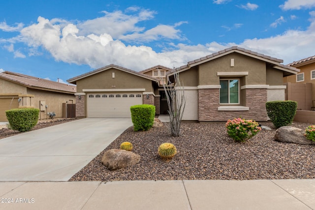 view of front of property with a garage