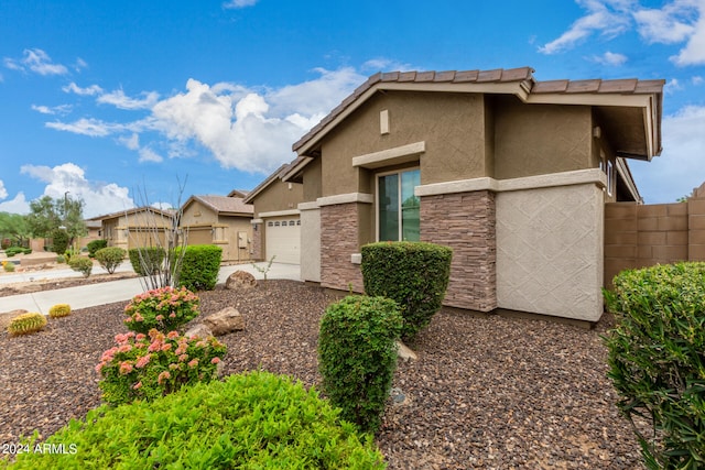 view of front of home with a garage