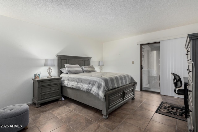 bedroom featuring access to exterior and a textured ceiling