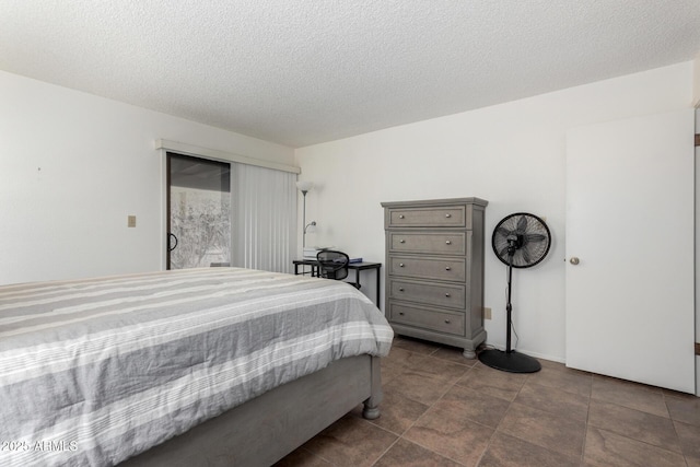 bedroom featuring a textured ceiling