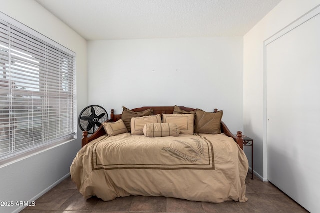 bedroom featuring a textured ceiling