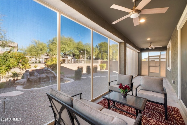 sunroom / solarium with ceiling fan and plenty of natural light