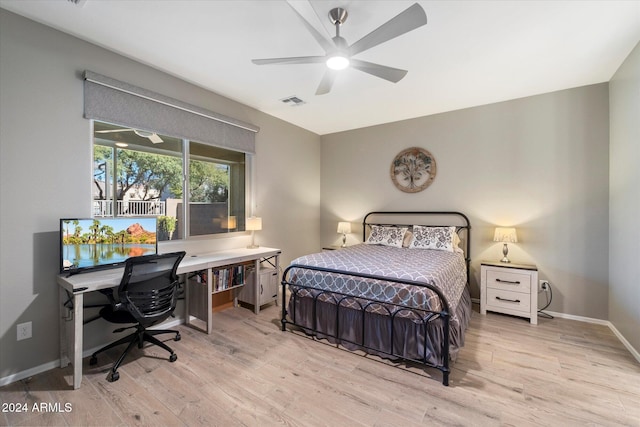 bedroom featuring ceiling fan and light hardwood / wood-style floors