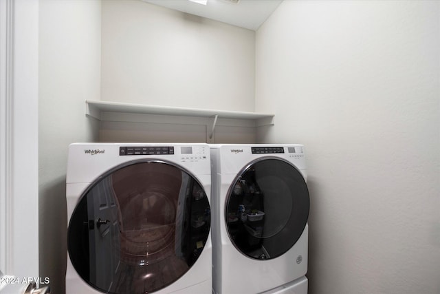 laundry room with washer and clothes dryer