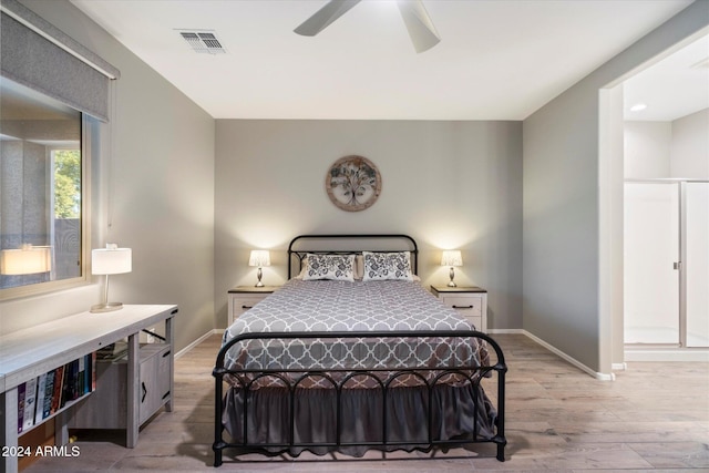 bedroom featuring ceiling fan and light hardwood / wood-style flooring