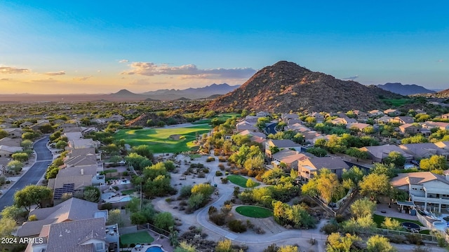 aerial view at dusk with a mountain view