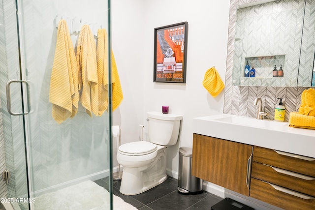 712 W Vernon Ave, Phoenix, AZ 85007 - full bath featuring toilet, vanity, tile patterned flooring, a shower stall, and baseboards