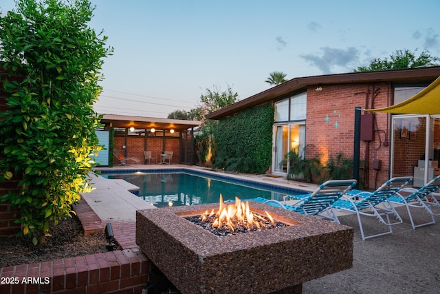 712 W Vernon Ave, Phoenix, AZ 85007 - view of swimming pool featuring a fire pit, a patio area, and a fenced in pool