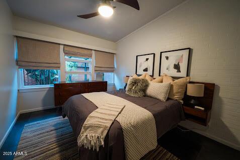 712 W Vernon Ave, Phoenix, AZ 85007 - bedroom featuring ceiling fan, lofted ceiling, and baseboards