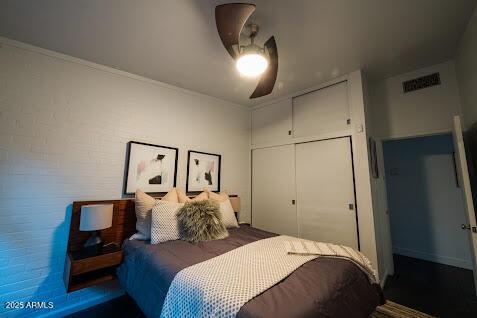 712 W Vernon Ave, Phoenix, AZ 85007 - bedroom with a ceiling fan, a closet, and visible vents