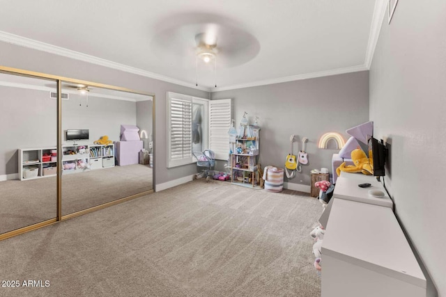 4392 W Charro Ln, Yuma, AZ 85365 - bedroom with carpet flooring, ornamental molding, baseboards, a closet, and a ceiling fan