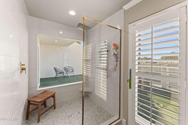 4392 W Charro Ln, Yuma, AZ 85365 - bathroom featuring a tile shower and tile walls