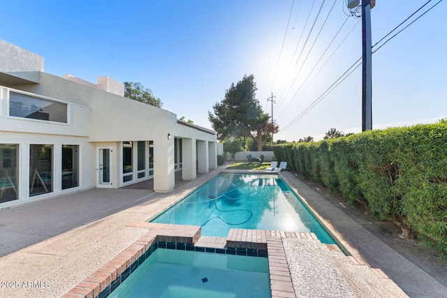 4392 W Charro Ln, Yuma, AZ 85365 - view of swimming pool with a fenced backyard and a pool with connected hot tub