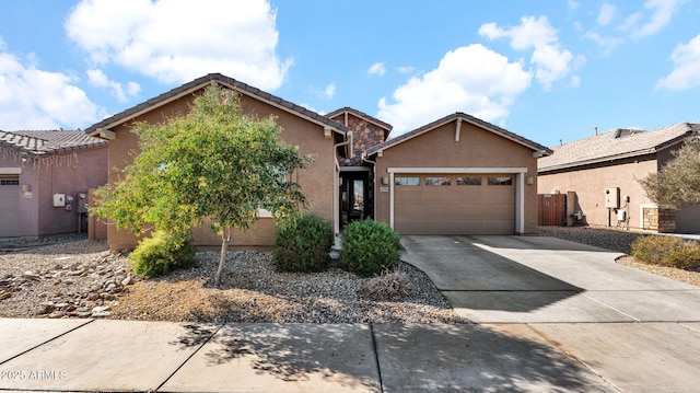 view of front of home with a garage