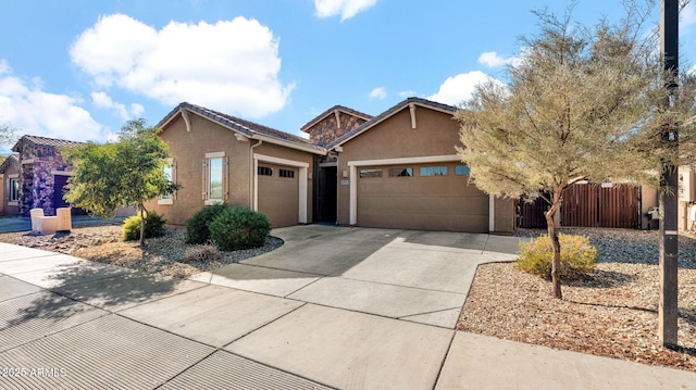 view of front of property with a garage