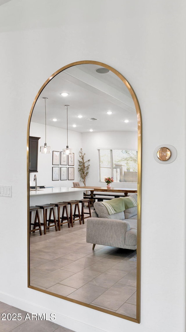 tiled living room with sink